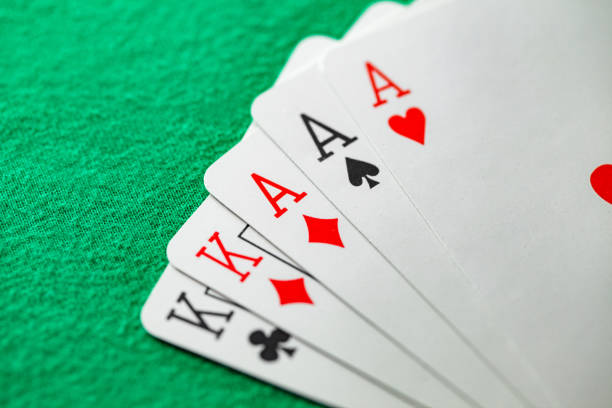 istock Playing cards, poker combination full house, three aces and two kings 1468331980