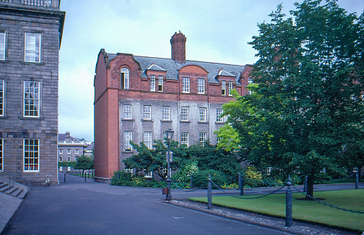 1980s old positive film scanned, the old Library and the new Quadrangle at Trinity College, Dublin, Ireland.