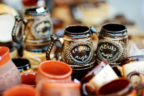 Ceramic dishes, tableware and jugs sold on Easter market in Vilnius. 'Kaziuko muge' means 'Kaziukas fair' in Lithuanian. Annual traditional crafts fair is held every March on Old Town streets.