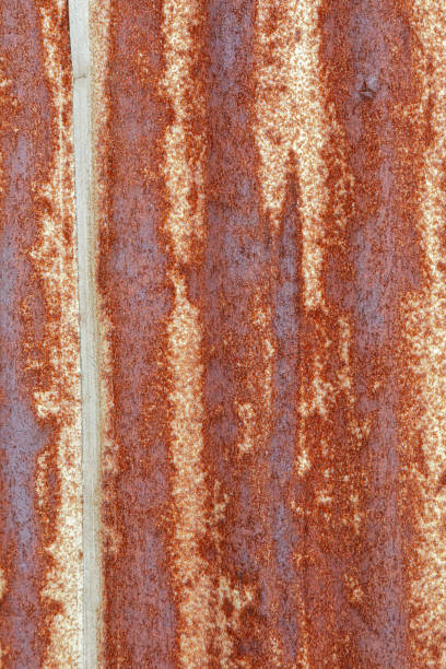 Old rusting corrugated metal wall Close up of an Old rusting corrugated metal wall corrugated metal fence ideas stock pictures, royalty-free photos & images