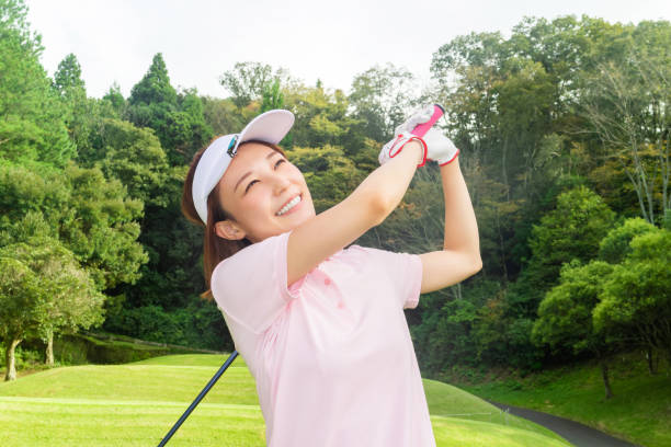 istock young asian woman play golf 1468350907