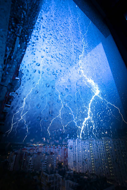 thunderstorm in the city stock photo