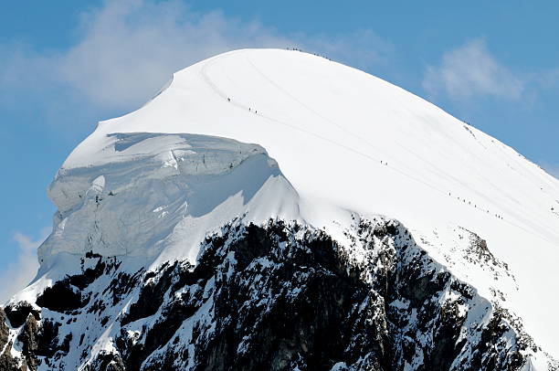 istock Zermatt tour climbers in the snow 146836035
