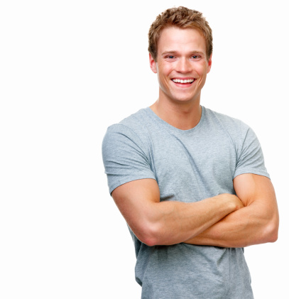 Close-up of a handsome young man smiling against white background