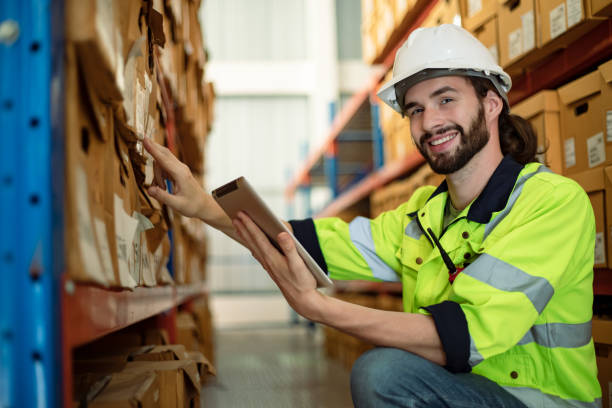 istock Happy male factory manager using digital tablet in warehouse 1468364115