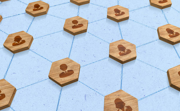 istock Wooden pieces representing People connected in a communication network. Corporate connection, information exchange and cooperation. 3D illustration 1468364416