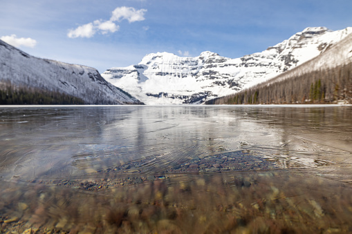 Cameron Lake in Waterton Lakes National Park, Alberta, Canada.

The lake is still frozen at the end of May.