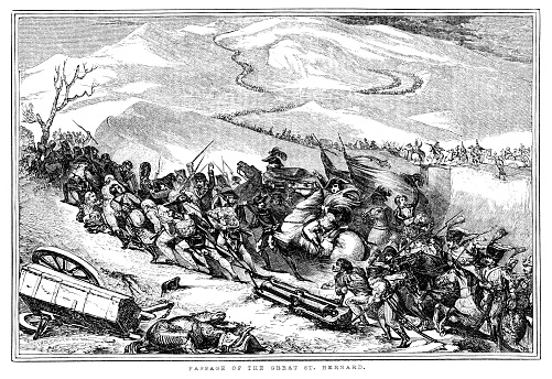 Napoleon Bonaparte marches his army through St. Bernard Pass in the Swiss Alps. Woodcut engraving published 1846. Original edition is from a history book my own archives. Copyright has expired and is in Public Domain.