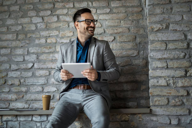 istock Happy businessman enjoying work in office. 1468369156