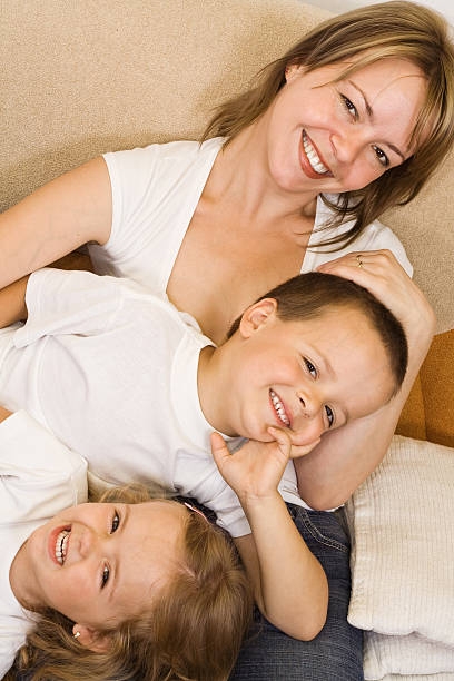 istock Woman and kids on the sofa 146836974