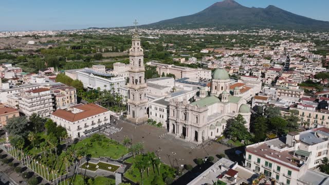 Basilica of the Shrine of Our Lady of the Rosary In Pompei, Italy - aerial drone shot