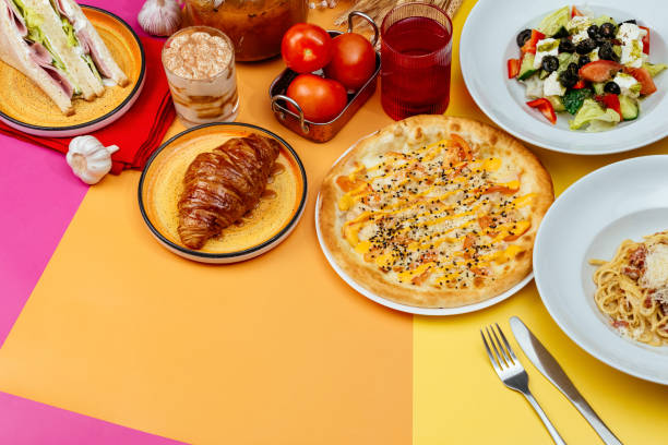 istock Italian pasta, pizza and caesar salad on bright backgrounds. moc 1468376909