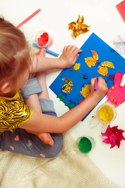 istock DIY Easter home decor from paper and plasticine, Gift ideas, painting Easter card. Handmade.  Childrens Easter crafts. 1468379020