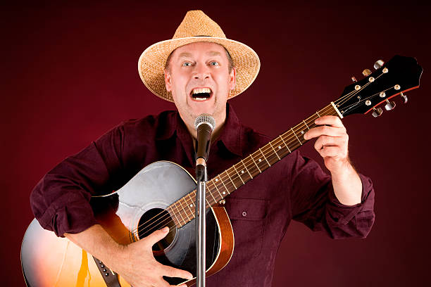 istock Singing and Playing Acoustic Guitar 146838334