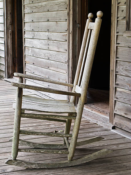 istock Rocking chair framed by door 146838357