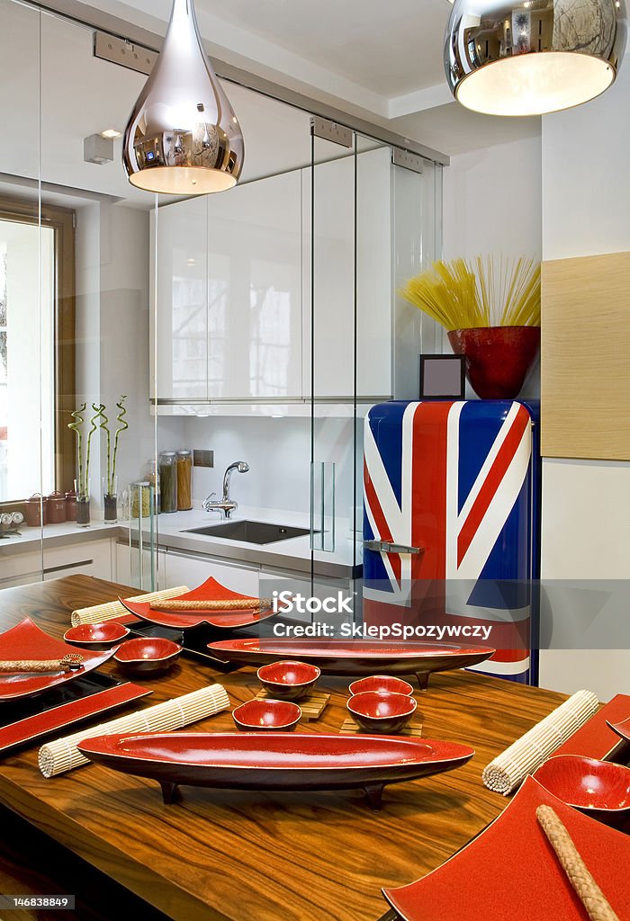 kitchen kitchen with table in modern apartment British Flag Stock Photo