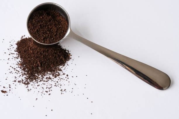 istock Ground Coffee Beans Spilled from a Scoop 1468392864