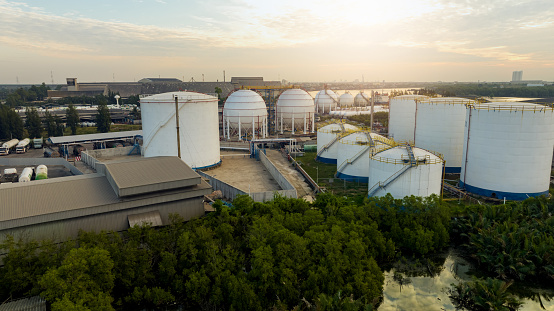 Aerial view of industrial gas storage tank in factory. LNG or liquefied natural gas storage tank. Global energy crisis. Energy price crisis. Natural gas storage industry. Above-ground gas storage tank