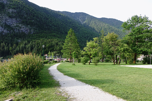 Walkway of outdoor park with mountain view in spring in Europe.
