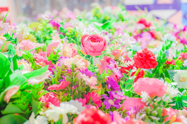istock Lots of artificial flowers, background 1468404683