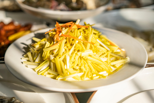 blanched garlic leaves on the plate