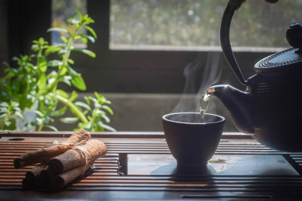 istock Tea hot drink on old background in composition on the table 1468412785
