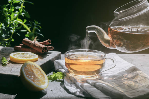 istock Tea hot drink on old background in composition on the table 1468412846