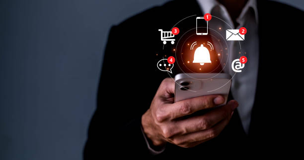 istock Business people using smartphone with virtual bell ringing for application notification alert concept, New email, digital marketing, electronic message alert. 1468423616