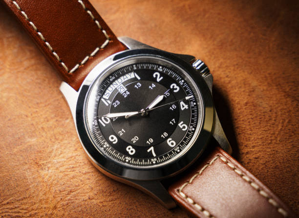 istock Close up of modern wristwatch with a browns leather strap 1468424396