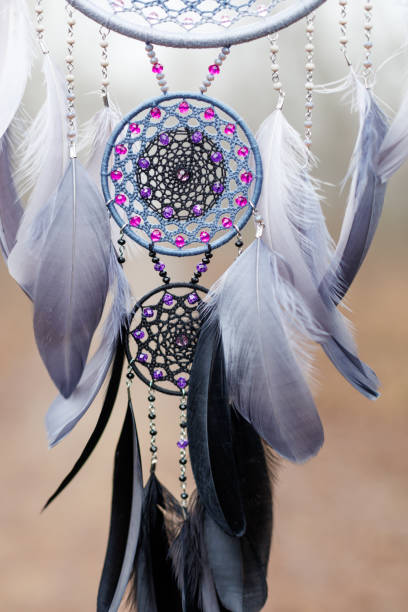 istock Handmade dream catcher with feathers threads and beads rope hanging 1468426469