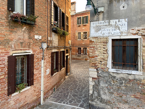 Two Different Doors of Two Different House, Venice, Italy.