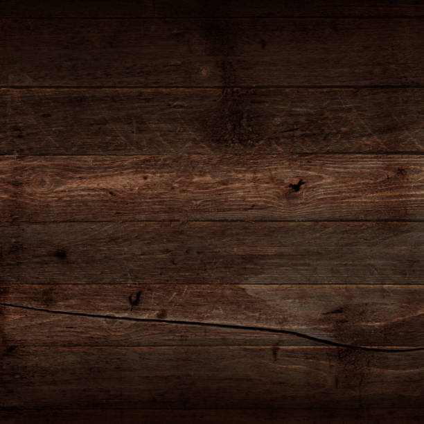 istock Dark brown wood texture background 1468431450