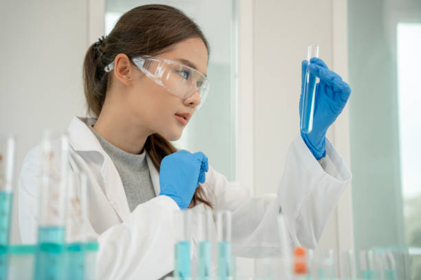 istock Scientist analyze biochemical sample in advanced scientific laboratory. Medical professional check chemical mix microbiological developmental of viral. Biotechnology research in science lab. cosmetic 1468435256