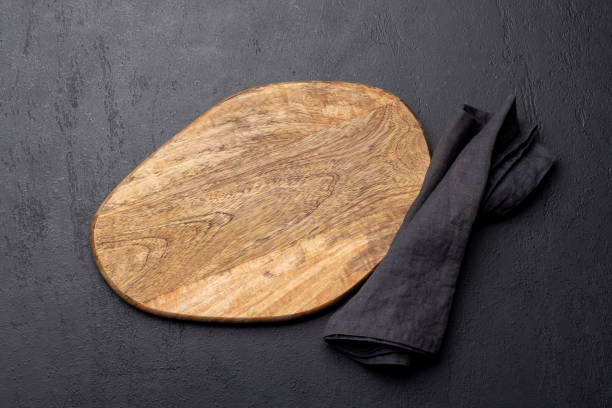 istock Wooden cutting board and kitchen towel 1468437134