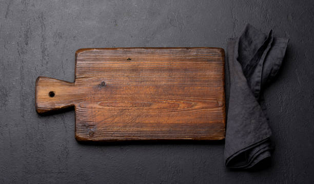istock Wooden cutting board and kitchen towel 1468437155