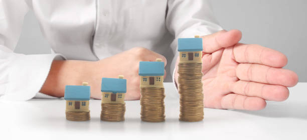 istock House Residential Structure in  hand 1468437253