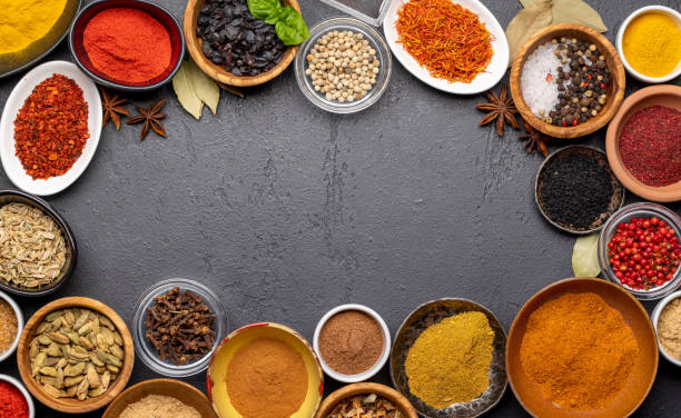 istock Various spices in bowls on stone table 1468437981