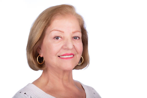 istock Smiling lady studio headshot over white background 1468438719