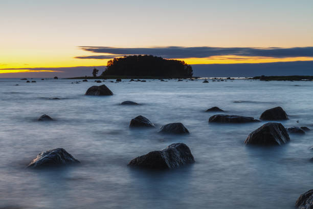 istock Twilight sunset at summer. Baltic sea coast with boulders. 1468441229