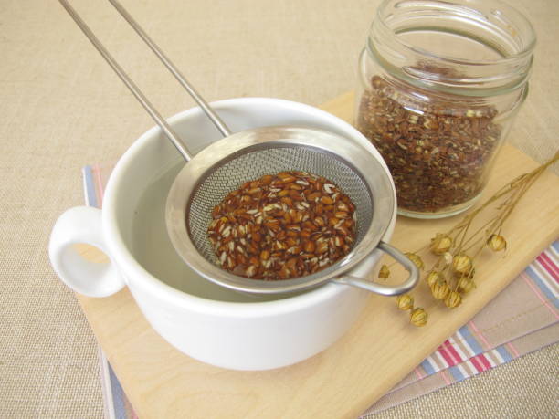 istock Flaxseed tea, a cup of tea from brown flax seeds 1468441420