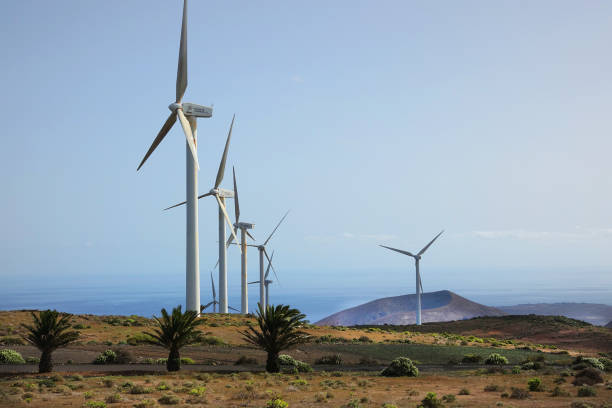 istock Red volcanic landscape with windmills 1468442899
