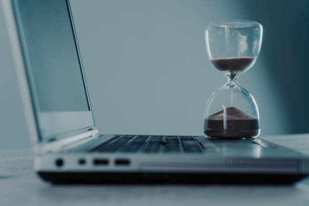 istock Laptop and hourglass 1468443540