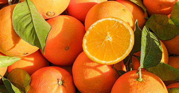 Close-up of organic oranges at farmers market in South Europe