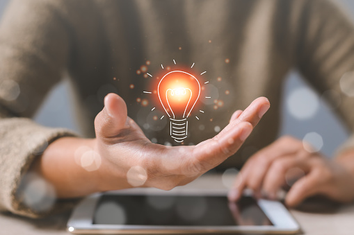 Opened hand with light bulb icon. Great inspiration and innovation new beginning. Presenting new ideas. Thinking imagination marketing online. Innovation for modern business intelligence concept.