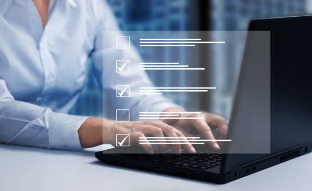 istock Survey form, check marks on checklist, filling online form and answering questions concept. 1468456749
