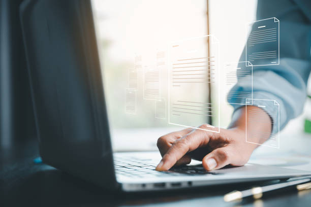 istock Concept of online document management technology. Businesspeople manage corporate databases through cloud, cyberspace technology and large, paperless archives of important, file and online storage. 1468462529
