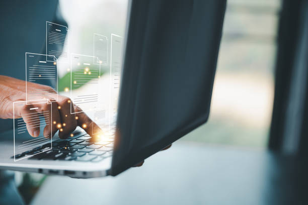 istock Concept of online document management technology. Businesspeople manage corporate databases through cloud, cyberspace technology and large, paperless archives of important, file and online storage. 1468462654