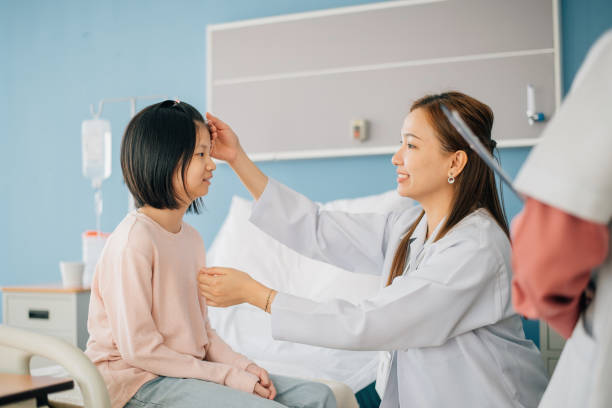 istock Asian Chinese Pediatrician having a check up on her patient 1468462872