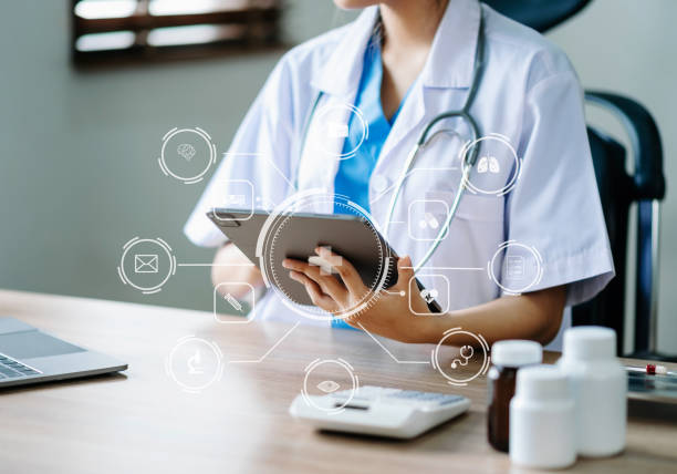 istock medical technology concept,smart doctor hand working with modern laptop computer with his team virtual icon diagram 1468465795