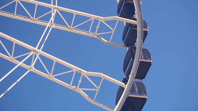 Closeup of Moving Ferris Wheel